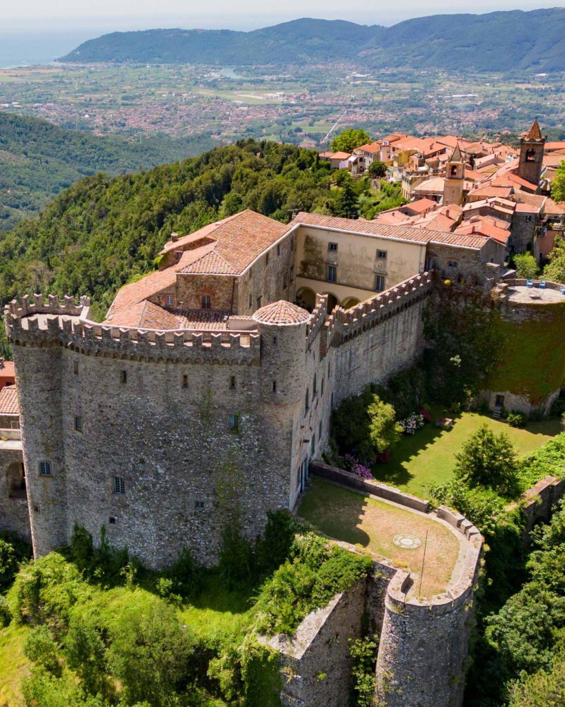 The Malaspina Castle with the Ligurian Sea in the background