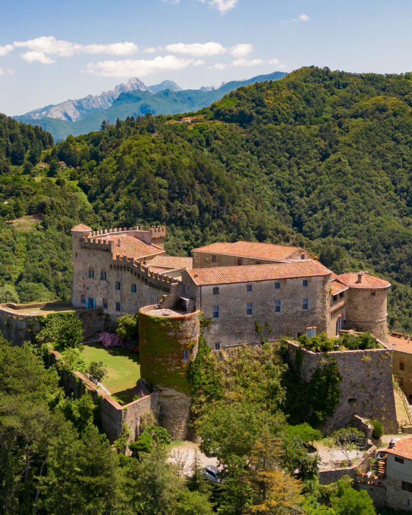 The Malaspina Castle with the Apuan Alps in the background